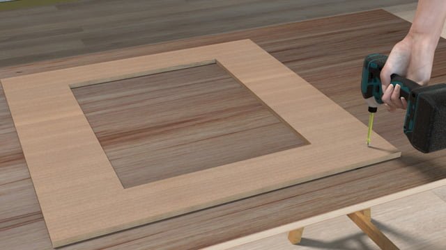 四角く繰り抜いた合板をランバーコア合板にビスで固定
