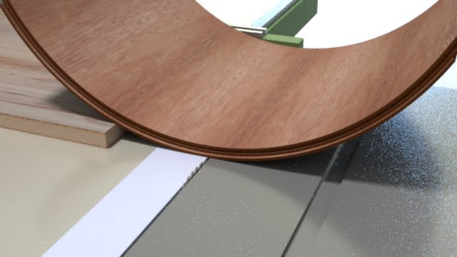 横切り盤に成型合板をセッティング