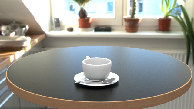 丸いテーブル天板にコーヒーカップが置いてある写真